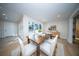 Dining area showcasing a modern table, comfortable seating, and bright natural light at 676 Sterling Dr, Charleston, SC 29412