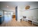 Bright entryway with hardwood floors, built-in bench, storage and views to the kitchen at 676 Sterling Dr, Charleston, SC 29412