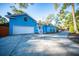 Home featuring an attached garage, a well-maintained driveway, and fresh exterior paint at 676 Sterling Dr, Charleston, SC 29412
