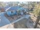 Charming single-Gathering home with a welcoming front porch and beautifully landscaped surroundings at 676 Sterling Dr, Charleston, SC 29412