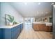 A modern kitchen with stainless steel appliances, and an island with a white countertop at 676 Sterling Dr, Charleston, SC 29412
