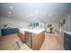 Well-appointed kitchen features a large island, farm sink, and modern stainless steel appliances at 676 Sterling Dr, Charleston, SC 29412