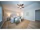 Cozy main bedroom features wood floors, a comfortable bed, and calming decor at 676 Sterling Dr, Charleston, SC 29412