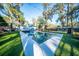 Beautiful pool with a modern design, surrounded by well-maintained green space at 676 Sterling Dr, Charleston, SC 29412