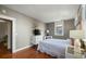 Cozy bedroom featuring hardwood floors, stylish decor, and comfortable furnishings at 7 West St # C, Charleston, SC 29401