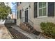 Close up of the home's front door with elegant brick steps at 7 West St # C, Charleston, SC 29401