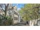 A view of the side and back of the house showing the charming street at 7 West St # C, Charleston, SC 29401