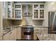 Gourmet kitchen boasts stainless steel appliances, custom cabinetry, and granite countertops at 7 West St # C, Charleston, SC 29401