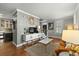 Cozy living area with hardwood floors and staircase access at 7 West St # C, Charleston, SC 29401