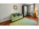 Inviting sitting room with comfortable seating, hardwood floors, and eclectic decor at 7 West St # C, Charleston, SC 29401