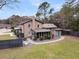 Aerial shot of a backyard featuring a garden, patio, and fenced perimeter at 739 Shamrock Ln, Charleston, SC 29412