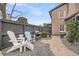 Charming backyard with a brick pathway, a well-kept garden, and comfortable outdoor seating at 739 Shamrock Ln, Charleston, SC 29412