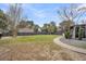Expansive backyard with a stone path, well-maintained lawn, and secure fenced perimeter at 739 Shamrock Ln, Charleston, SC 29412