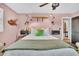 Charming bedroom with a comfortable bed, natural light, and unique decor at 739 Shamrock Ln, Charleston, SC 29412