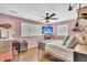 Cozy bedroom featuring a comfortable bed, ceiling fan, and a mounted television at 739 Shamrock Ln, Charleston, SC 29412