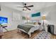 Bedroom with a ceiling fan, television and bright, natural light at 739 Shamrock Ln, Charleston, SC 29412