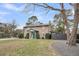 Lovely two-story home boasting a metal roof and a neatly landscaped front yard at 739 Shamrock Ln, Charleston, SC 29412