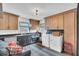 Bright laundry room with sink, ample cabinetry and modern appliances at 739 Shamrock Ln, Charleston, SC 29412