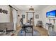 Bright home office with a modern desk, comfortable chair, stylish decor, and plenty of natural light at 739 Shamrock Ln, Charleston, SC 29412