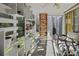 Relaxing porch with natural lighting, plants, and view of backyard at 7900 Shadow Oak Dr Dr, North Charleston, SC 29406