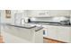 Modern kitchen with stainless steel appliances and a breakfast bar at 8656 Laurel Grove Ln, North Charleston, SC 29420