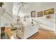 Cozy living room with hardwood floors, a fireplace, and comfortable seating at 8656 Laurel Grove Ln, North Charleston, SC 29420