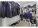 Walk-in closet has a large amount of storage space with clothing racks and shelving at 8957 N Red Maple Cir, Summerville, SC 29485