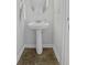 A powder room with a pedestal sink and neutral wall color at 8957 N Red Maple Cir, Summerville, SC 29485