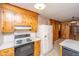 Cozy kitchen featuring wooden cabinetry, linoleum floors and bright countertops at 904 Randall Dr, Mount Pleasant, SC 29464