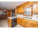 Efficient kitchen featuring wooden cabinetry, linoleum floors and bright countertops at 904 Randall Dr, Mount Pleasant, SC 29464