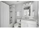 Clean, bright bathroom with white tile, shower, and a vanity at 972 Key Colony Ct, Mount Pleasant, SC 29464
