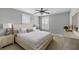 Bright bedroom with neutral color scheme, ceiling fan, and a comfortable bed at 972 Key Colony Ct, Mount Pleasant, SC 29464