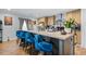 Kitchen island with counter seating, ample prep space, and stainless steel appliances at 1026 Cane Gully Rd, Moncks Corner, SC 29461