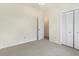 Bright bedroom features carpet, natural light and double door closet at 103 Hazelton Ct, Goose Creek, SC 29445