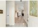 View from the foyer into the living area, highlighting the fireplace and flooring at 103 Hazelton Ct, Goose Creek, SC 29445