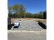 Cleared homesite with sign, offering opportunity to build a dream home in a desirable location at 106 Abbey Terrace Rd, Moncks Corner, SC 29461