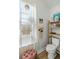 Bright powder room with a toilet, window and decorative accents at 109 Osprey Ridge Ln, Summerville, SC 29483