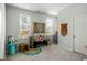 Cozy bedroom with natural light and unique bohemian decor and furnishings at 109 Osprey Ridge Ln, Summerville, SC 29483