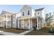 Charming two-story home featuring a welcoming front porch with classic columns and a well-manicured lawn at 109 Osprey Ridge Ln, Summerville, SC 29483