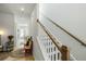 Hallway and staircase with wood floors and natural light at 109 Osprey Ridge Ln, Summerville, SC 29483