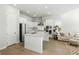 Modern kitchen with white cabinetry, stainless steel appliances, and a large island perfect for cooking at 109 Osprey Ridge Ln, Summerville, SC 29483