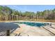 A refreshing community pool surrounded by a tranquil wooded area, perfect for relaxation and recreation at 109 Osprey Ridge Ln, Summerville, SC 29483