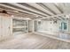 Mirrored walls, wood beam ceiling, and wood look tile flooring make this a perfect basement space at 11 Church St, Charleston, SC 29401