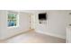 Bright bedroom with tile floor, and a built in entertainment center at 11 Church St, Charleston, SC 29401