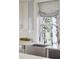 Close-up view of kitchen sink under window, stainless steel sink, and marble countertop at 11 Church St, Charleston, SC 29401