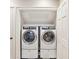 Convenient laundry closet with side-by-side washer and dryer at 11 Church St, Charleston, SC 29401