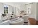 Bright and inviting living room with hardwood floors and large windows at 11 Church St, Charleston, SC 29401