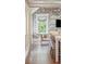 Cozy room showcases exposed brick, a comfortable seat, and natural light at 11 Church St, Charleston, SC 29401