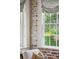 Close up of the brick wall detail and view from the window at 11 Church St, Charleston, SC 29401
