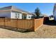 Backyard featuring a well-maintained lawn, and a stylish wooden fence for added privacy and appeal at 113 Mayfield Dr, Goose Creek, SC 29445
